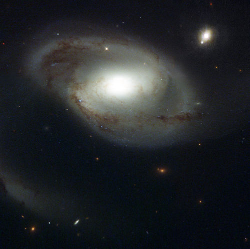 Underexposed photo by NASA of NGC 4319 Galaxy and Mark 205 (Public Domain)